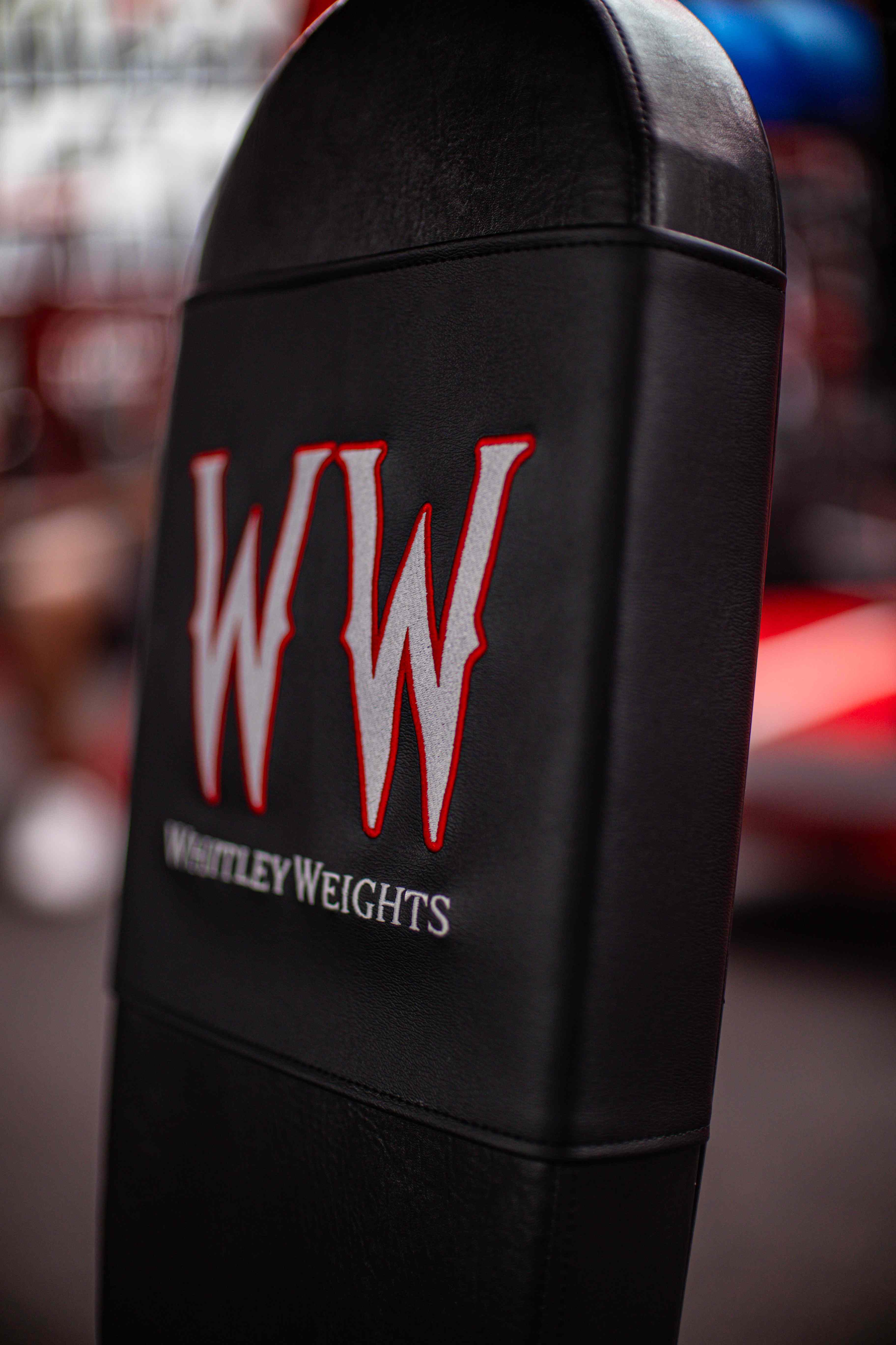 Close-up of the Whitley Weights logo on a bench pad