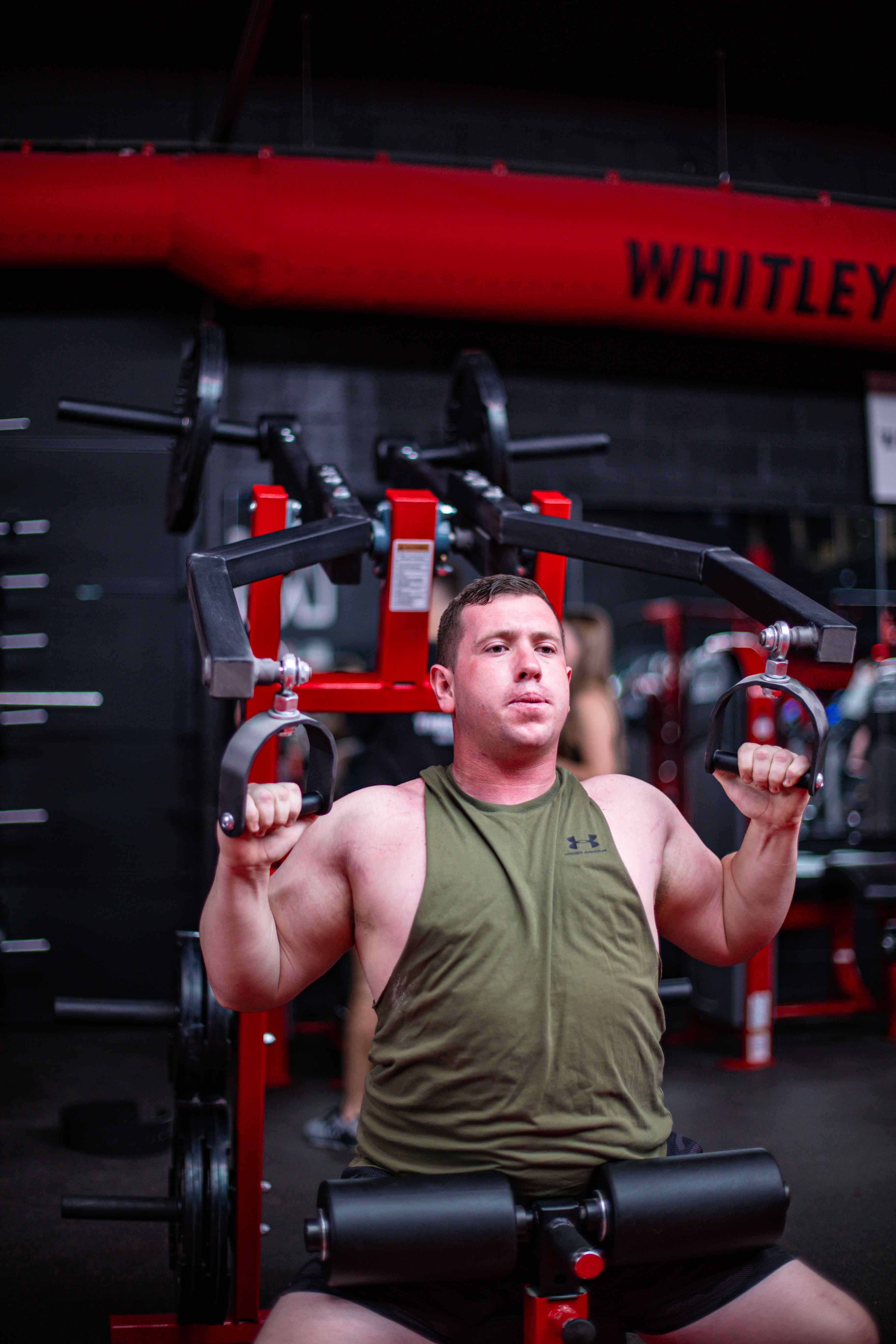 Member training chest on a converging press machine
