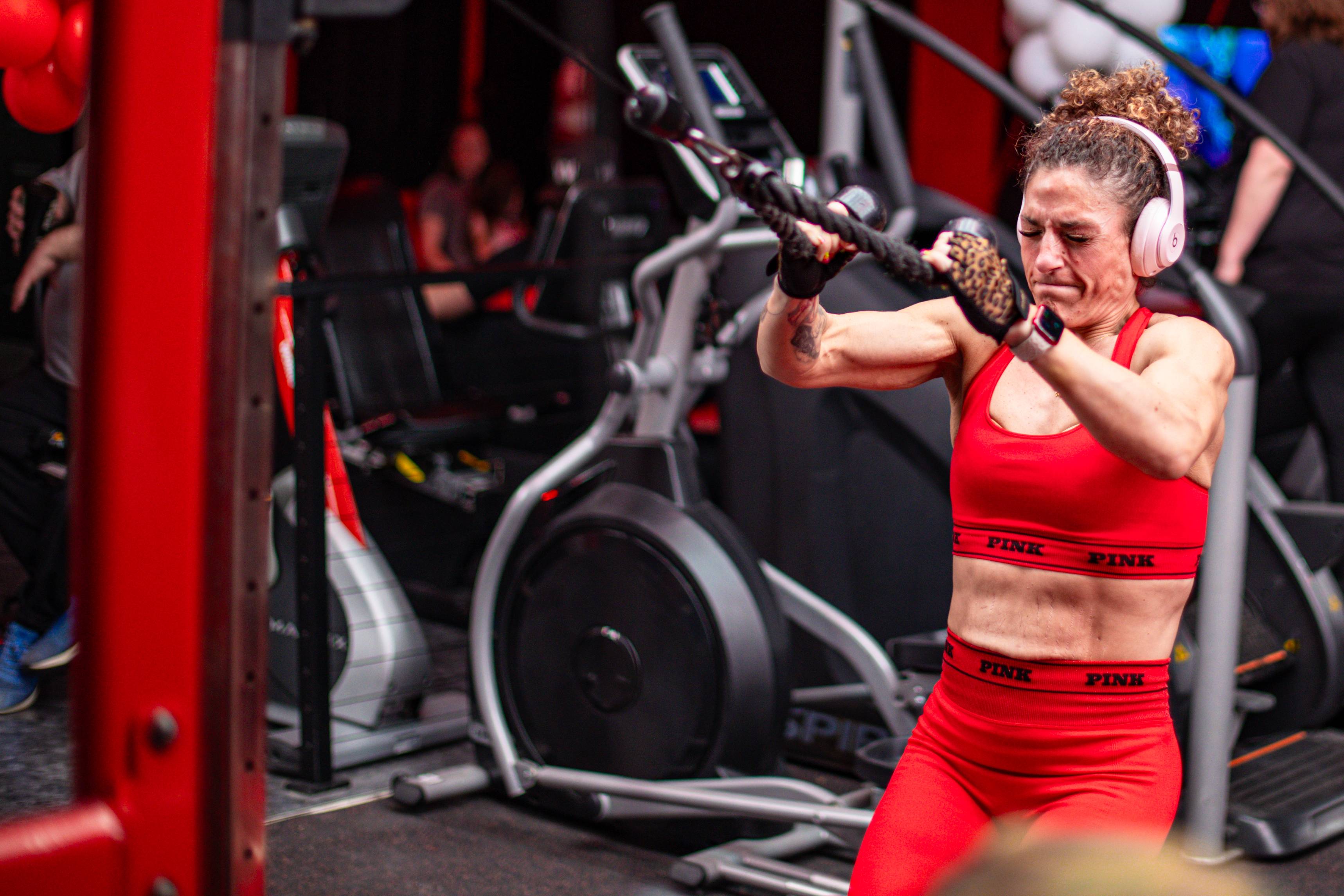 Athlete doing cable rope conditioning work in the cardio area