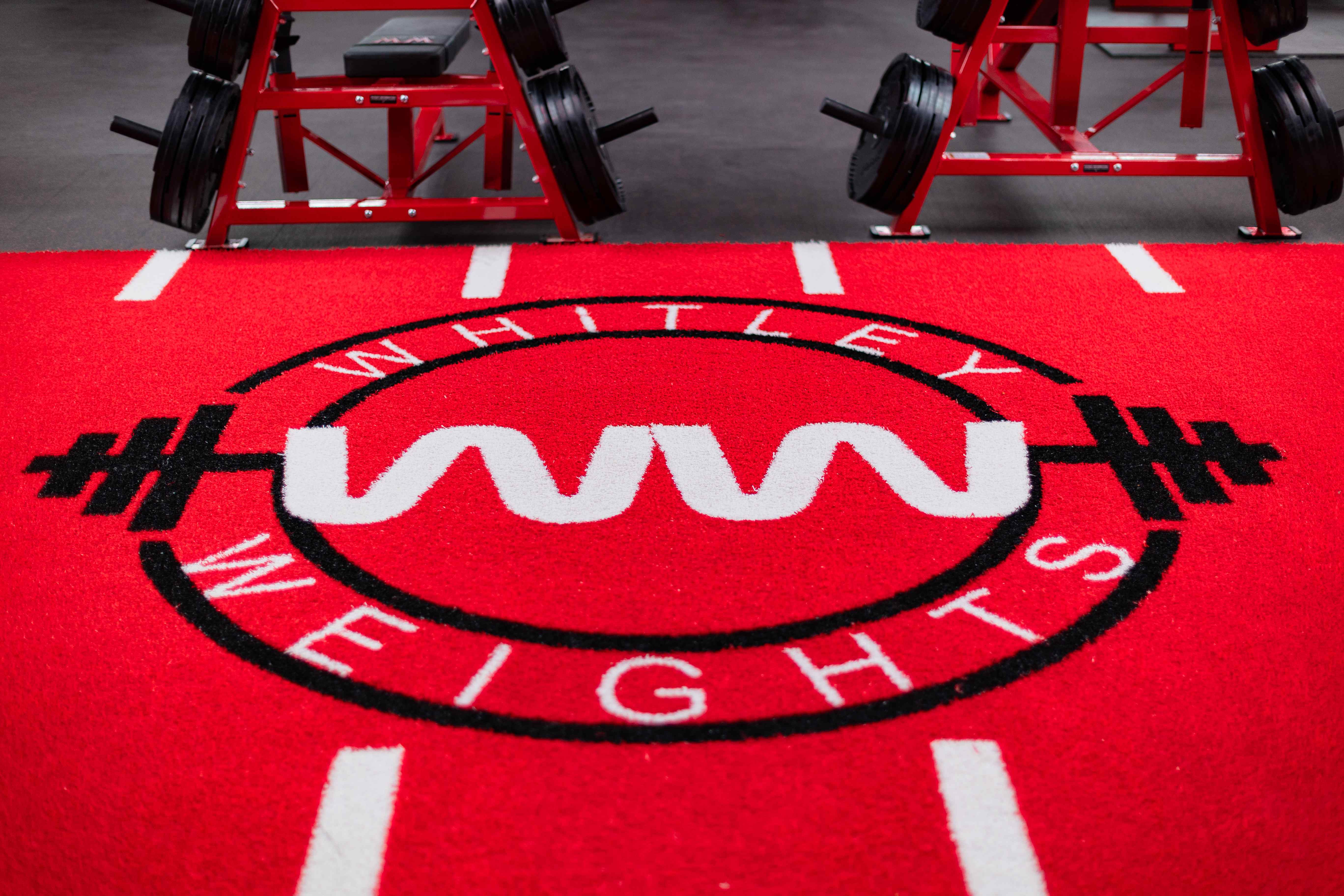 Close-up of the Whitley Weights logo turf