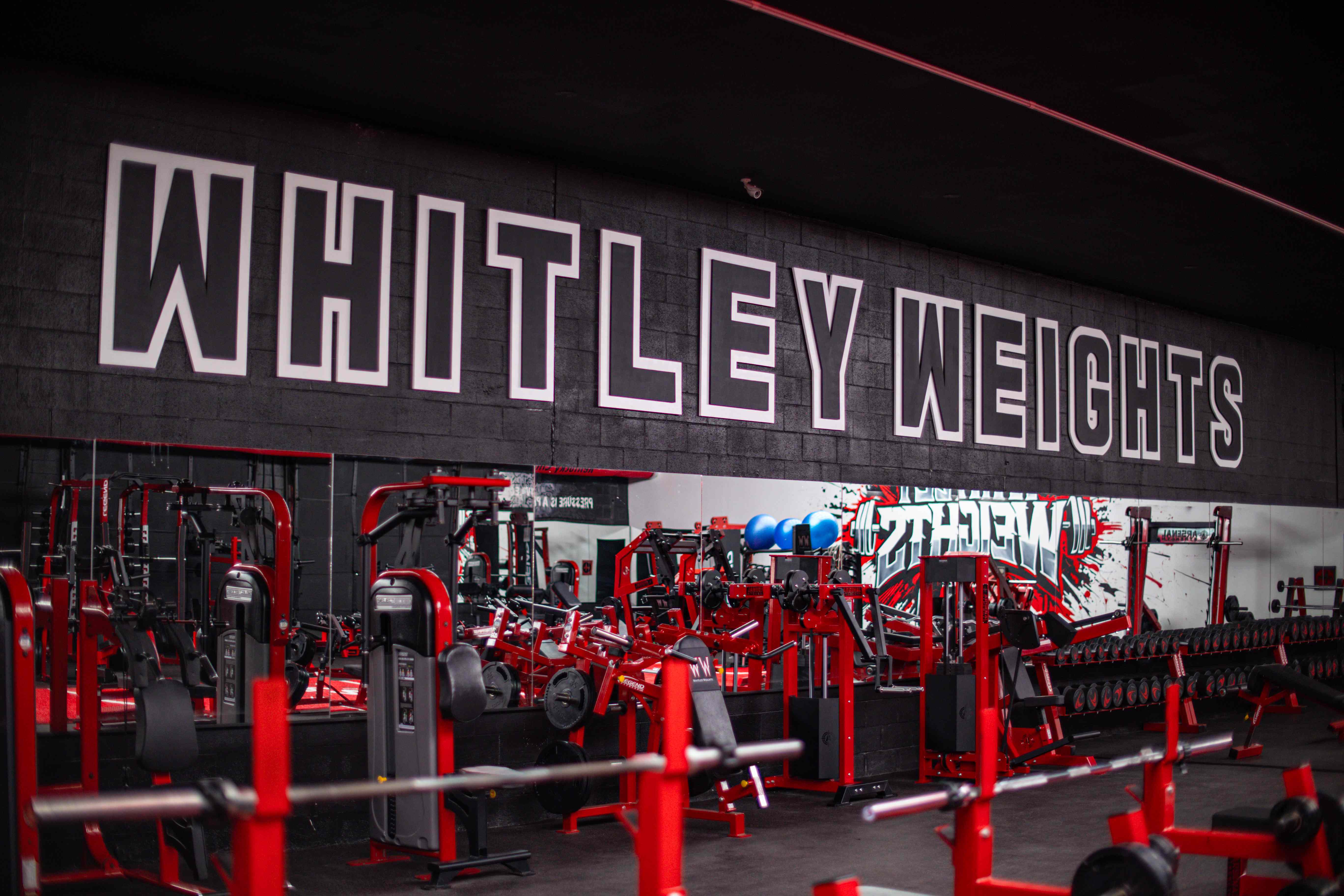 Whitley Weights block lettering above the main training floor